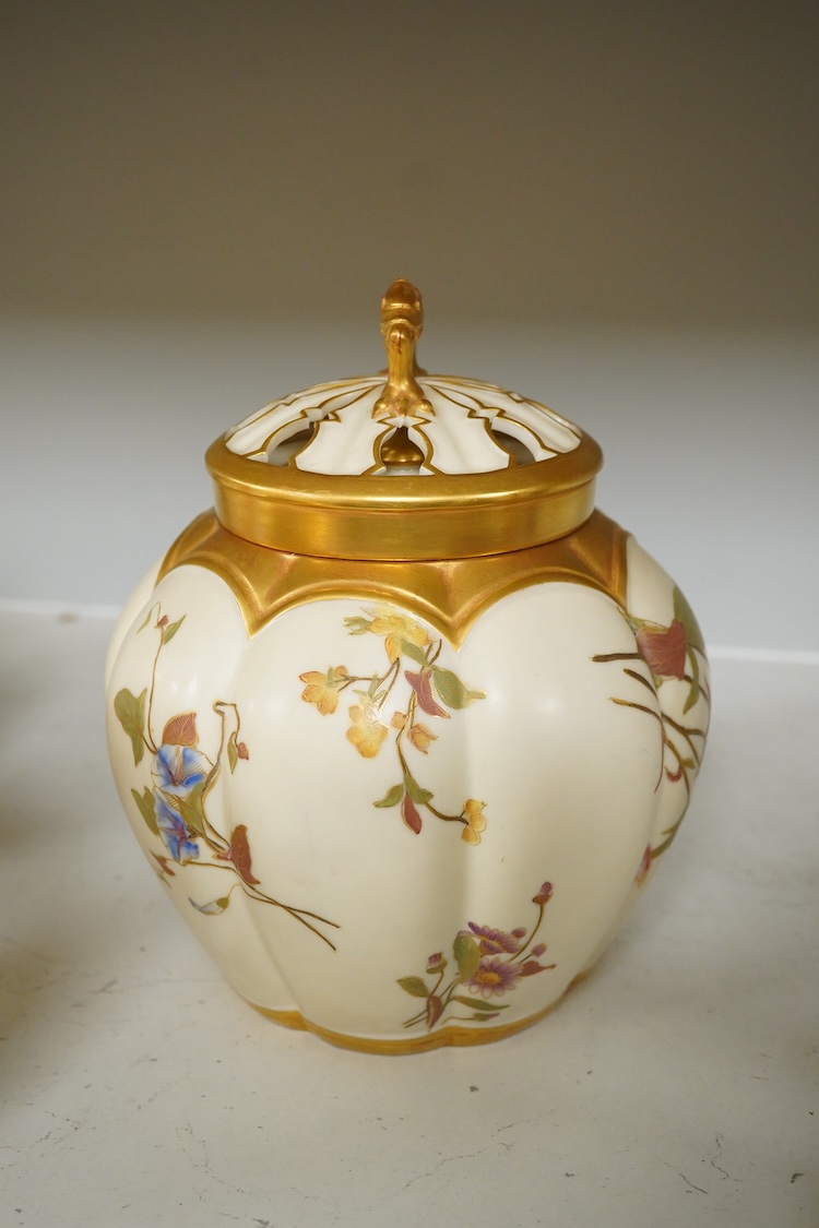 Three 19th century Worcester blush ivory potpourri or biscuit jars and covers, two with liners, each decorated with flowers and buds, largest 20cm high